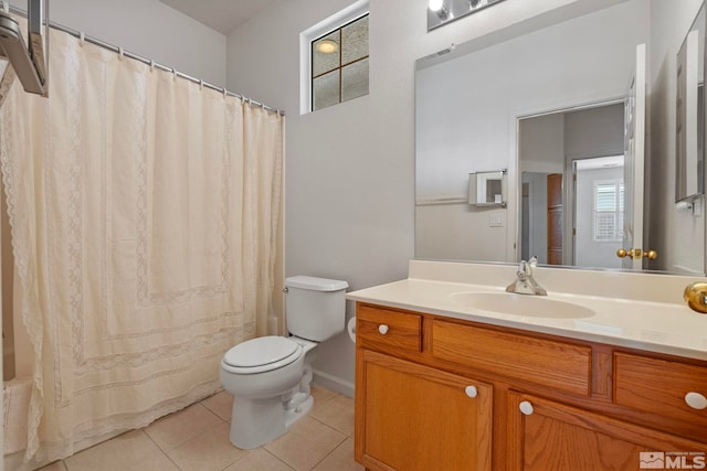 full bathroom with vanity, curtained shower, tile patterned flooring, and toilet