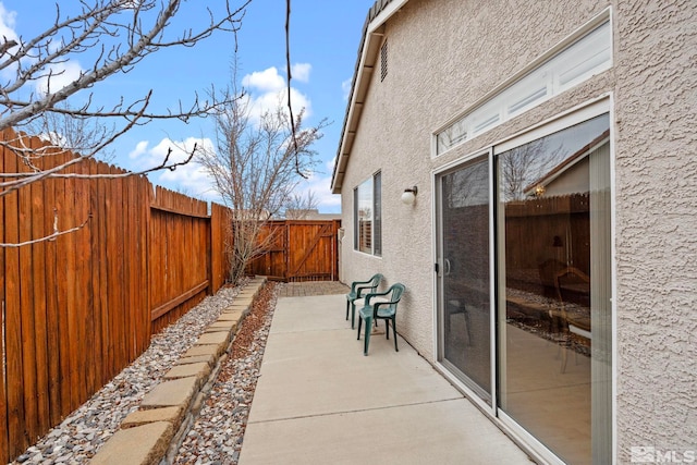 view of patio featuring a fenced backyard