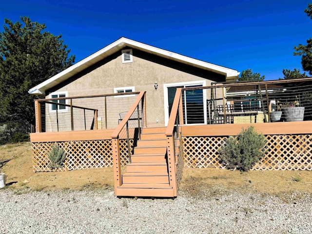 view of front of house with a deck