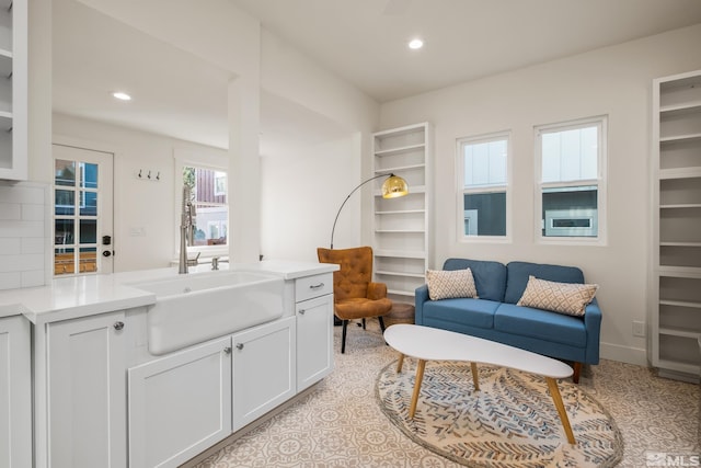 sitting room featuring recessed lighting