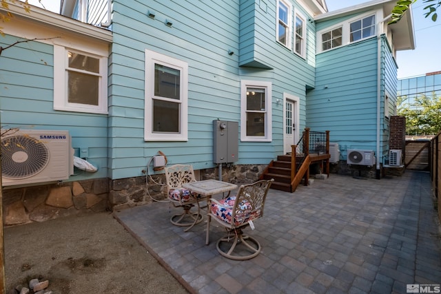 view of patio featuring ac unit