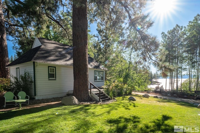 exterior space with a yard