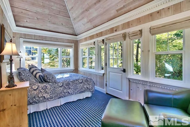 carpeted bedroom with wood ceiling, wooden walls, lofted ceiling, and ornamental molding