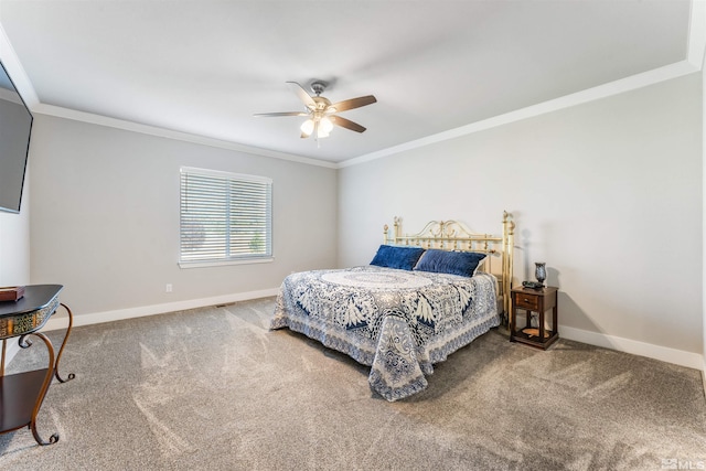 bedroom featuring a ceiling fan, carpet flooring, crown molding, and baseboards