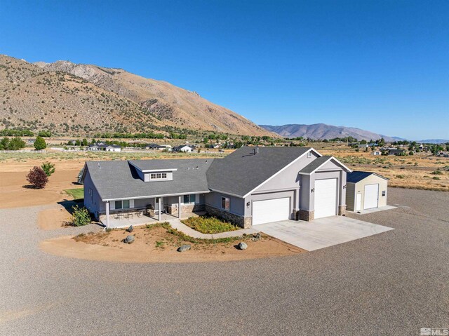 ranch-style house with a mountain view