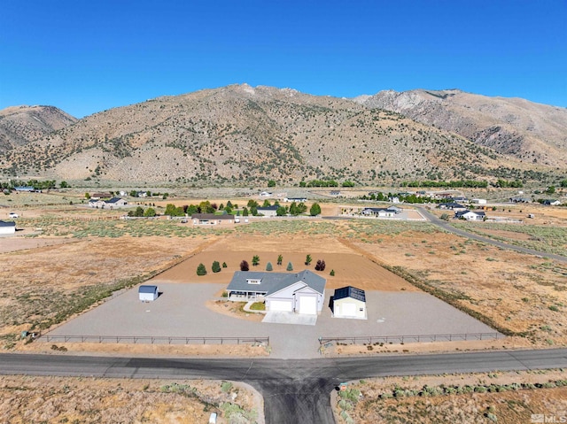 mountain view featuring a rural view