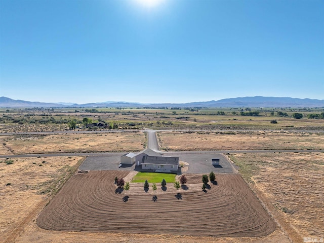 bird's eye view with a mountain view and a rural view