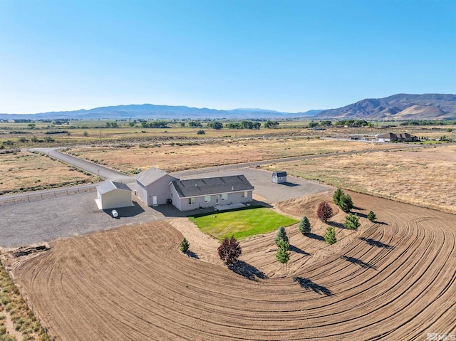 birds eye view of property featuring a rural view and a mountain view