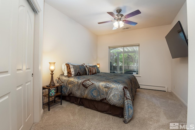 bedroom featuring light colored carpet, visible vents, a baseboard heating unit, a ceiling fan, and baseboards