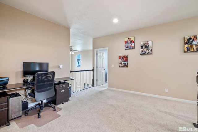 carpeted home office with ceiling fan