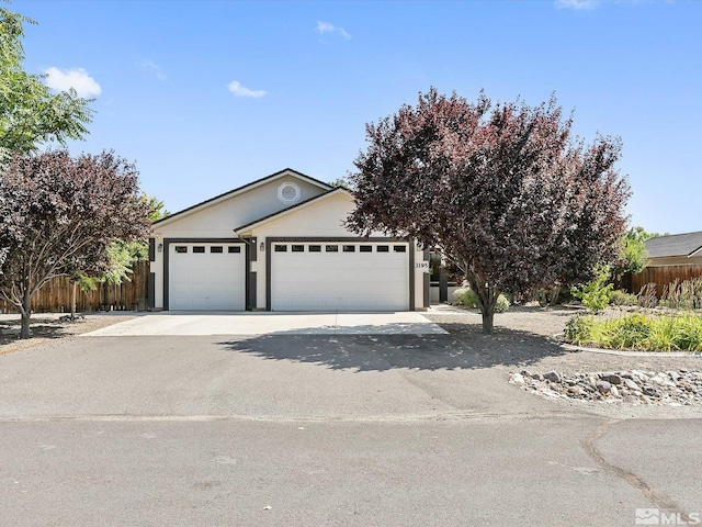 view of front of home with a garage