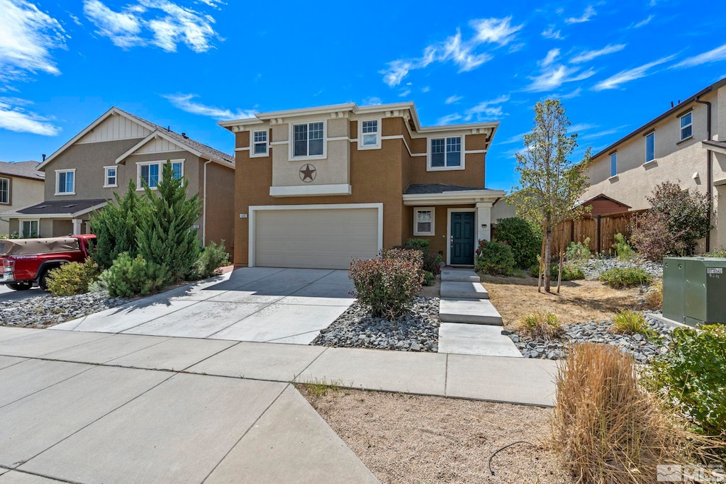 view of front of property featuring a garage