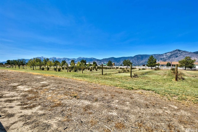 view of mountain feature with a rural view