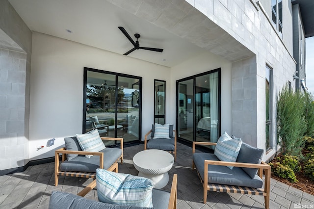 view of patio with ceiling fan and an outdoor hangout area