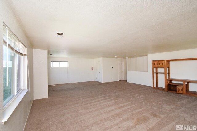 interior space with a textured ceiling