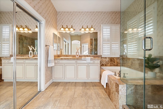 bathroom with vanity and plus walk in shower