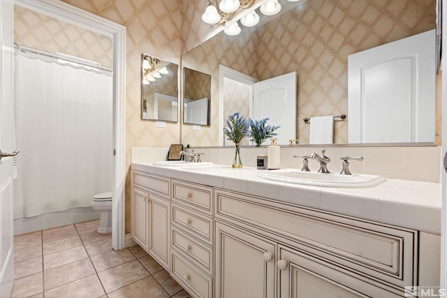 full bathroom with tile patterned flooring, vanity, toilet, and shower / bath combination with curtain