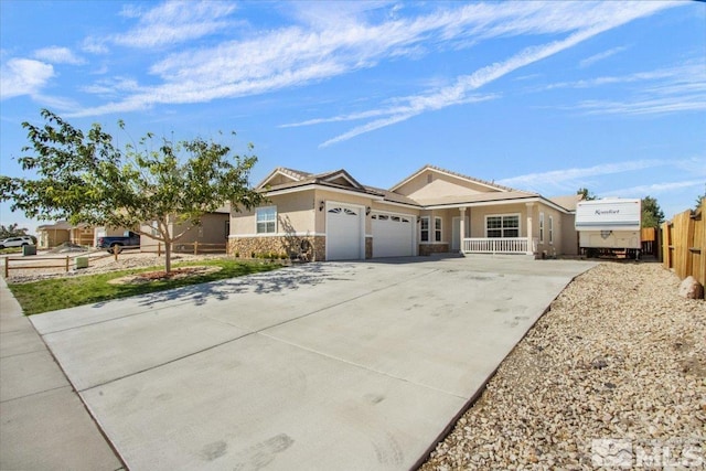 ranch-style house featuring a garage, driveway, stone siding, a porch, and stucco siding