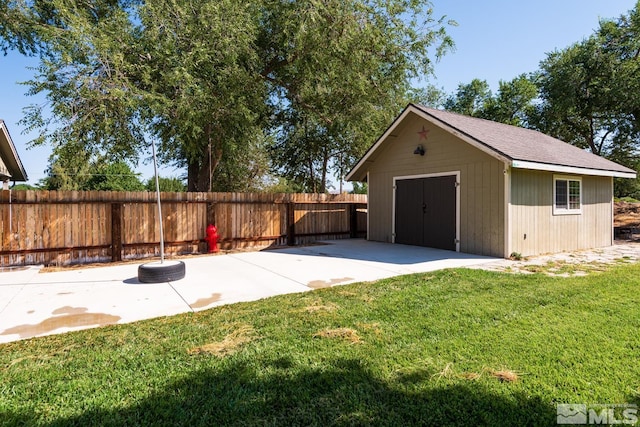 view of yard featuring a shed and a patio