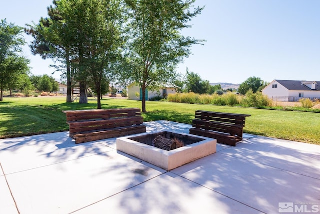 view of patio featuring a fire pit