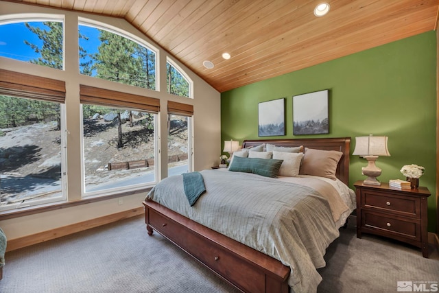 bedroom featuring lofted ceiling, carpet floors, and wooden ceiling