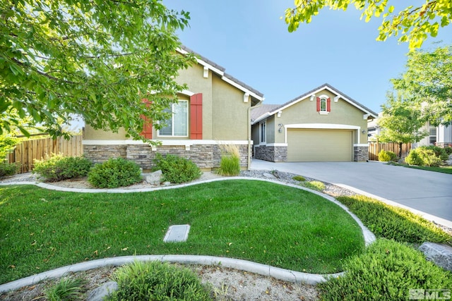 view of front facade with a front yard and a garage