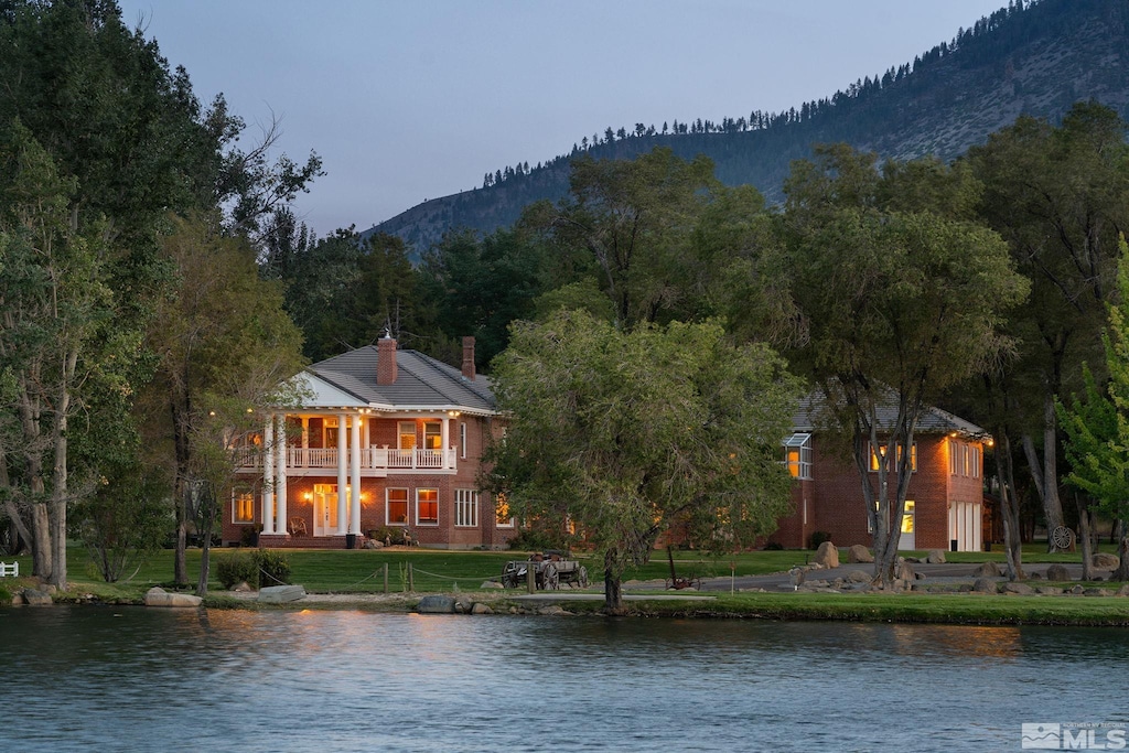 property view of water featuring a mountain view