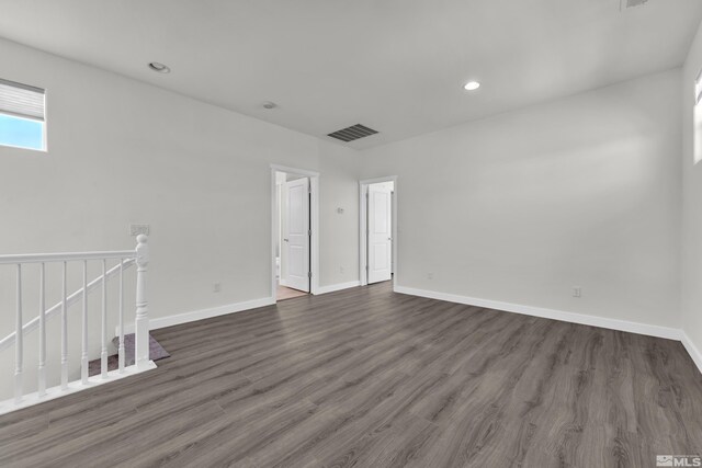 unfurnished bedroom with wood-type flooring, a closet, and ceiling fan