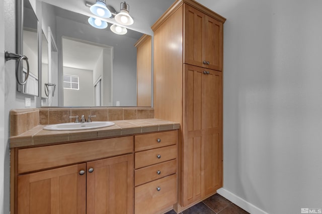 bathroom with vanity and tile patterned floors