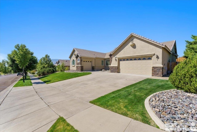 ranch-style house with stucco siding, concrete driveway, a garage, stone siding, and a front lawn