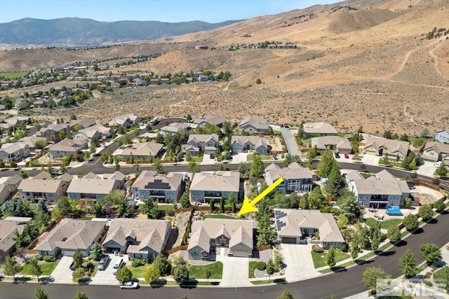 aerial view featuring a mountain view