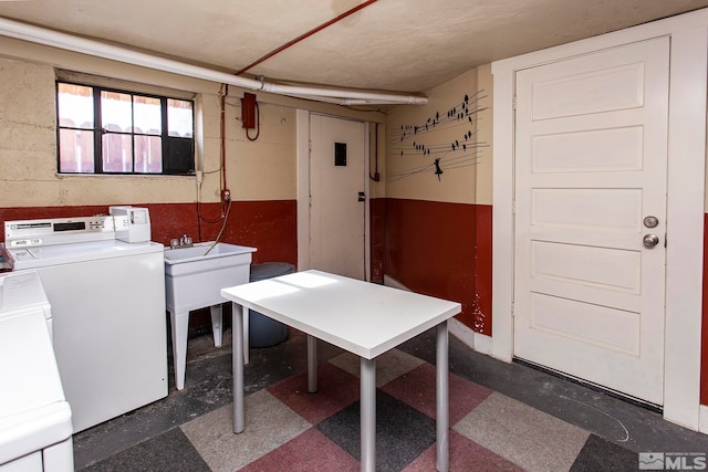 laundry area with washing machine and dryer