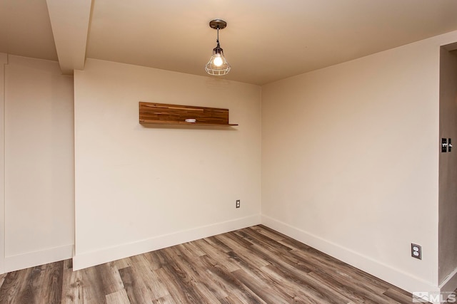 unfurnished room featuring hardwood / wood-style floors