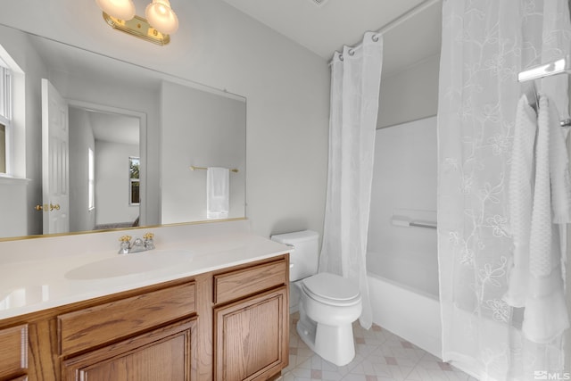 bathroom with toilet, shower / bathtub combination with curtain, and vanity