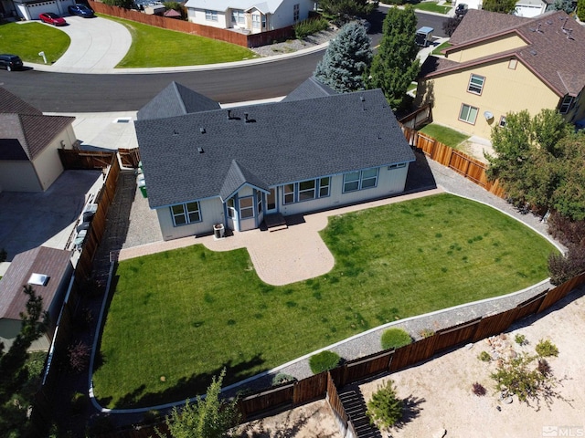 birds eye view of property with a residential view