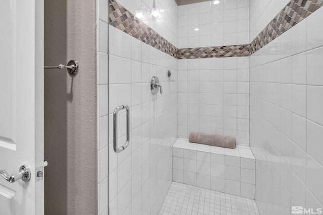 bathroom featuring walk in shower