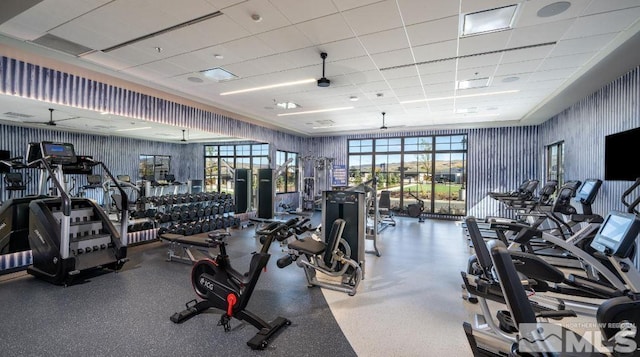 workout area featuring a paneled ceiling