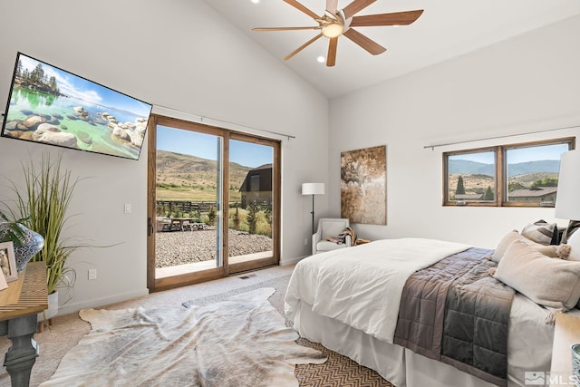 carpeted bedroom with high vaulted ceiling, ceiling fan, and access to exterior