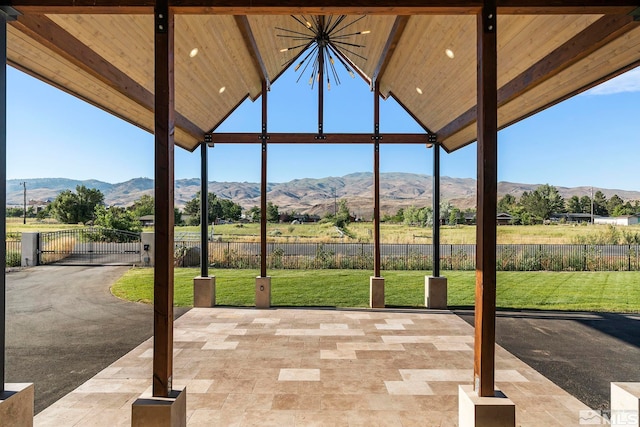 view of patio featuring a gazebo and a mountain view