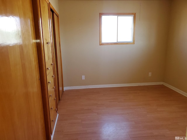 unfurnished bedroom featuring light hardwood / wood-style floors