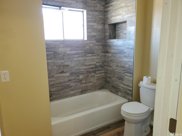 bathroom featuring hardwood / wood-style floors and toilet