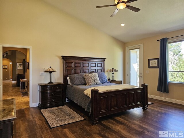 bedroom featuring ceiling fan, high vaulted ceiling, and dark hardwood / wood-style flooring