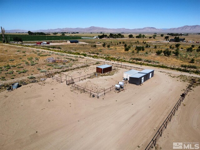 bird's eye view with a mountain view and a rural view