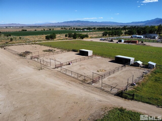 bird's eye view featuring a rural view and a mountain view