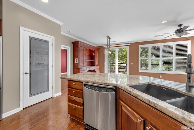 kitchen featuring light stone countertops, decorative light fixtures, dishwasher, wood-type flooring, and ceiling fan