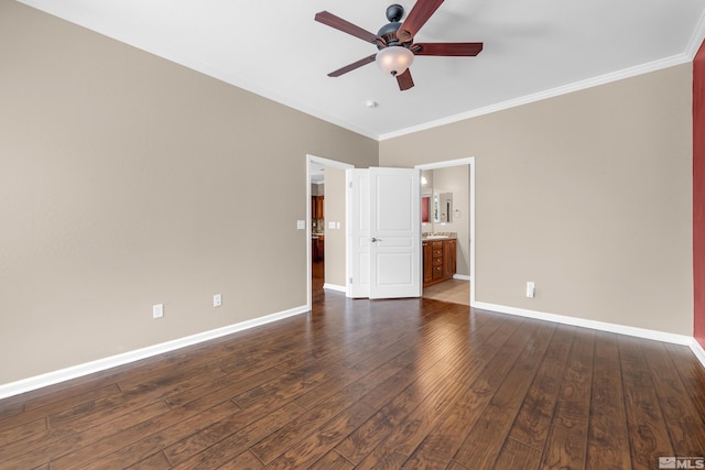 empty room featuring ceiling fan, dark hardwood / wood-style flooring, and ornamental molding