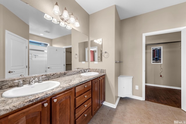 bathroom featuring vanity and wood-type flooring