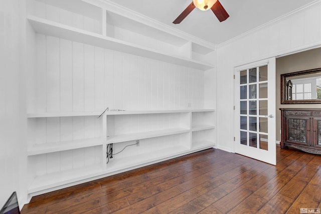 empty room featuring ornamental molding, ceiling fan, and dark hardwood / wood-style floors