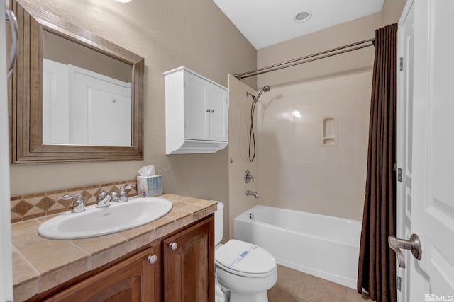 full bathroom with tile patterned flooring, shower / bath combination with curtain, toilet, and vanity