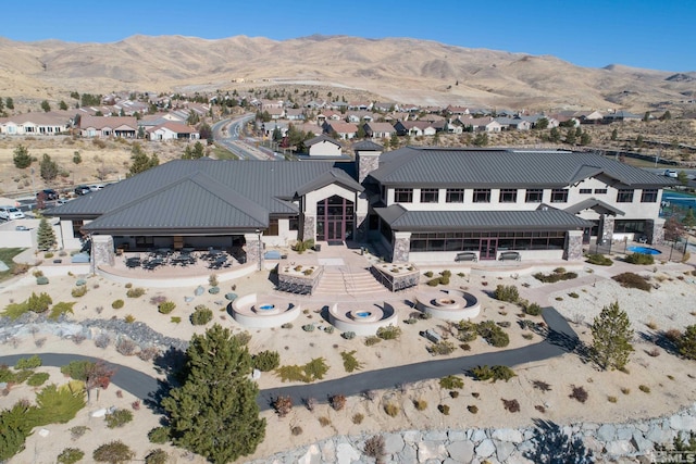 drone / aerial view featuring a mountain view